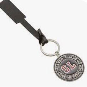 New Saint Laurent Keychain. See photos for measurements. Comes with dust bag